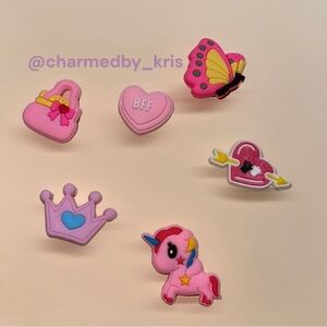 51. Croc charms - pink themed